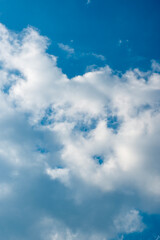 Vivid Blue Sky with Fluffy White Clouds