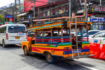 Obraz premium Colorful public transportation tuk tuk car taxi in Phuket Thailand.