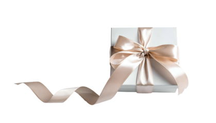 White gift box with gold ribbon against a solid black background