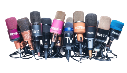Microphones clustered with labels, wires tangled