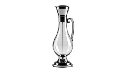 Elegant glass pitcher with metal accents on black background