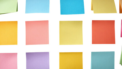 Fototapeta premium Colorful sticky notes in a grid pattern
