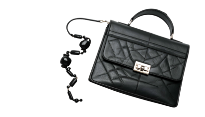 Black quilted bag with silver clasp, beaded strap