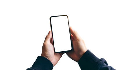 Person holding smartphone with bright blank screen against a dark background