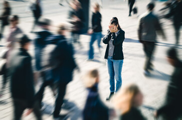 Stress, anxiety, fear or panic attack in public. Depressed woman with mental health disorder or...