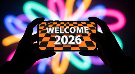Creative Colorful Neon Welcome 2026 Message Displayed on Mobile Device Technology
