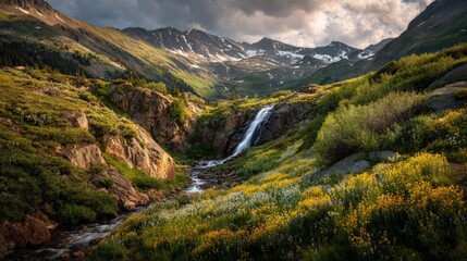 Dramatic spring landscape a waterfall cascading into a valley of wildflowers golden hour lighting beautiful and majestic