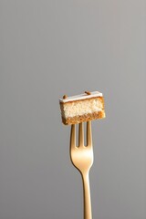 Abstract Dessert Photography: Small Caramel Cake Piece on a Fork