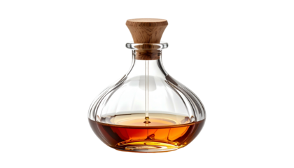 Elegant bottle filled with golden liquid on a black background