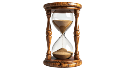 Sand flows in a wooden hourglass on a black background