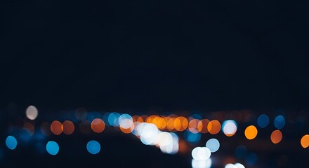 Abstract Bokeh Background of Blurred City Lights with Copy Space


