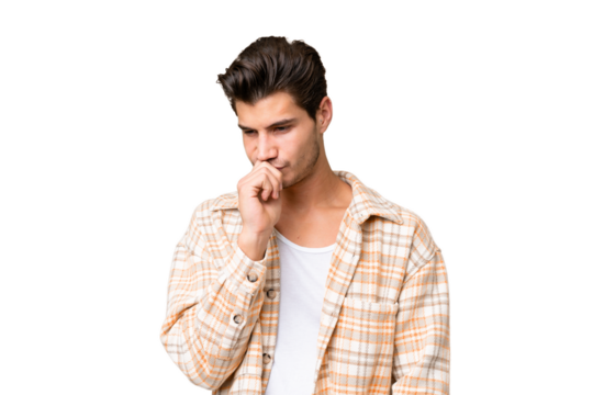 Young handsome caucasian man over isolated background having doubts