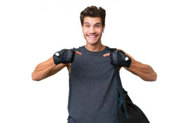 Young sport caucasian man with sport bag over over isolated background with surprise facial expression