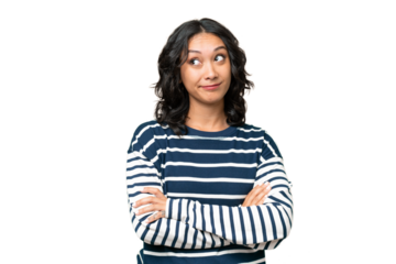 Young Argentinian woman over isolated background making doubts gesture while lifting the shoulders