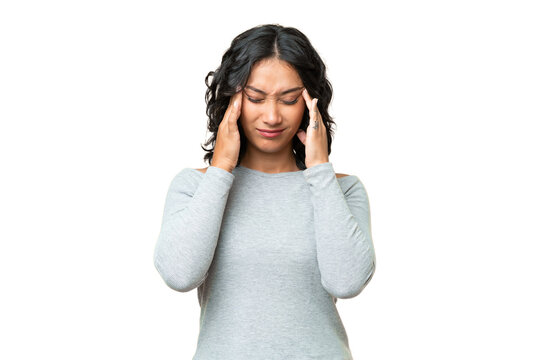 Young Argentinian woman over isolated background with headache
