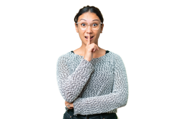 Young Uruguayan woman over isolated chroma key background showing a sign of silence gesture putting finger in mouth