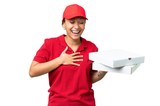 pizza delivery woman with work uniform picking up pizza boxes over isolated chroma key background smiling a lot
