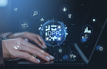 Hands typing on laptop with glowing DPP hologram and digital supply chain icons on dark background, representing logistics and product traceability concept.