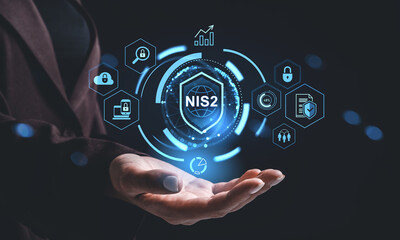 Futuristic NIS2 cybersecurity hologram interface concept above an open hand with digital padlock...