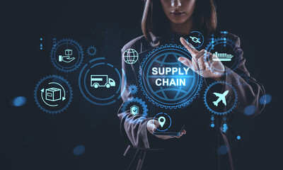 Futuristic supply chain concept with glowing holographic logistics icons and businesswoman interacting with virtual interface in dark digital space.