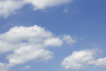 Fototapeta premium Blue sky with puffy clouds