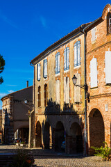 Naklejka premium Facades of the Buildings Around the Grain Market Hall in the Historic Center of Auvillar