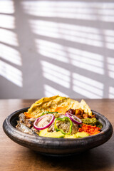 Anwamo (Oiled Rice), Africa Ghana Traditional Dish with Fried Eggs, Sardine, Avocado, and Fried Plantain