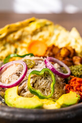 Anwamo (Oiled Rice), Africa Ghana Traditional Dish with Fried Eggs, Sardine, Avocado, and Fried Plantain
