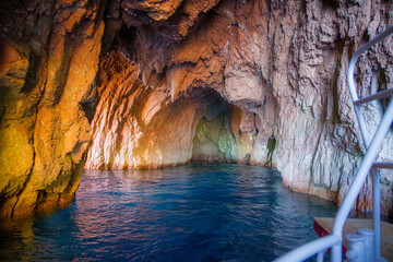 a cave near Calanche de Piana in the Gulf of Porto, a nature reserve with impressive red cliffs