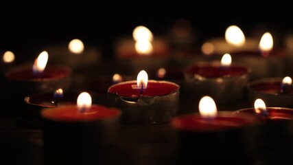 Red Candles with Soft Bokeh Light Effects and Warm Glowing Flames in Dark Atmospheric Setting - Powered by Adobe