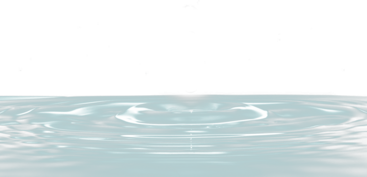 Water droplet impact, creating concentric ripples.
