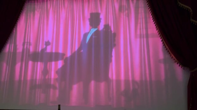 Chocotopia House Projection Mapping at Shiroi Koibito Park, Hokkaido. a show introduces visitors to the invention of chocolate. shadow puppet show in the curtain