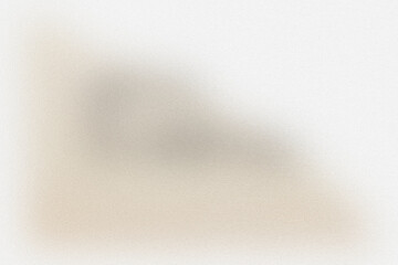 Close-up of a textured, abstract background with subtle earthy tones and a gentle gradient.