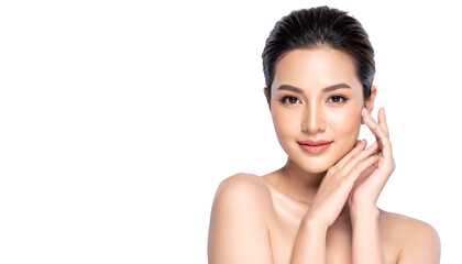 Beautiful woman with radiant skin and natural makeup on black background