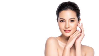 Beautiful woman with radiant skin and natural makeup on black background