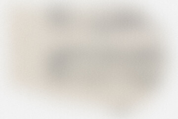 Close-up of a textured beige fabric with subtle darker threads woven throughout, suggesting a natural, organic material.