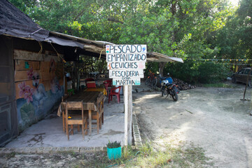 El Cuyo, Mexico; November 1, 2025: Local fresh fish restaurant in El Cuyo, a fishing village in the Yucatan region of Mexico.