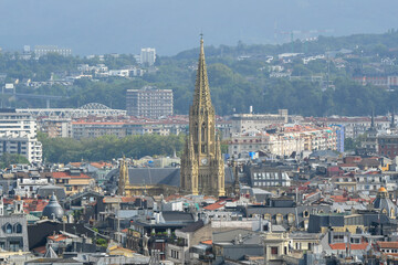 View of Cathedral Buen Pastor and San Sebastian (Donostia) town on sunny summer day. Basque Country, Spain.