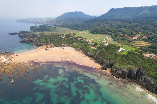 Aerial view of Amio Beach on sunny summer day. Pechon, Spain.