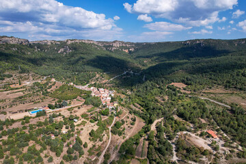Aerial view of La Febr&oacute; village on sunny summer day. Prades Mountains, Tarragona, Spain.