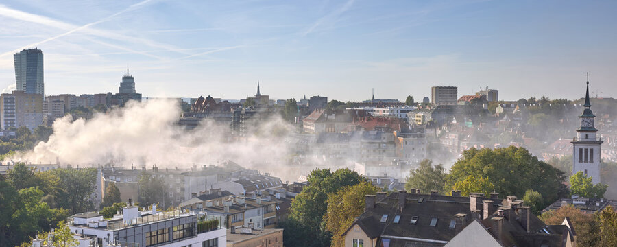 Smoke from the chimneys of coal heated houses.