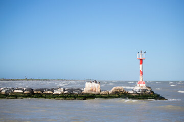El Cuyo, Mexico; November 1, 2025: Entrance to the sea of ​​the port of a fishing village in Yucatan.
