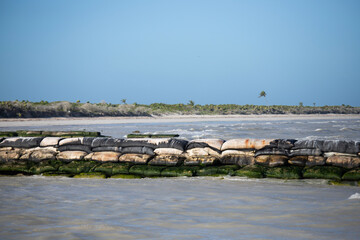 El Cuyo, Mexico; November 1, 2025: Entrance to the sea of ​​the port of a fishing village in Yucatan.