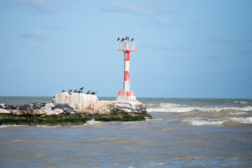 El Cuyo, Mexico; November 1, 2025: Entrance to the sea of ​​the port of a fishing village in Yucatan.