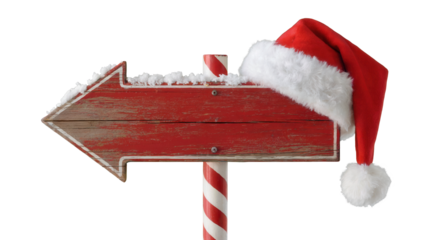 Rustic red wooden arrow signpost adorned with fluffy white snow and a festive santa hat pointing left isolated on transparent background
