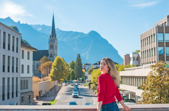 European tourist woman in Liechtenstein Square. Travel Concept