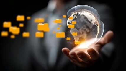 Businessman holds transparent globe with glowing digital folders floating around, futuristic technology on dark background, concept of data sharing - Powered by Adobe