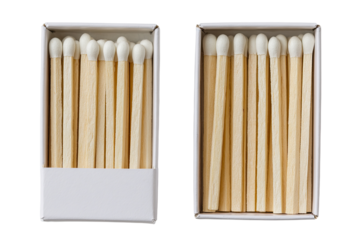 Two white cardboard matchboxes, each filled with wooden matches,  arranged side-by-side.  White heads on light beige sticks.  Straight and even