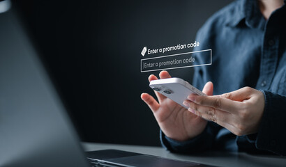promo, code, discount, checkout, A person entering a promotion code on a smartphone screen,...