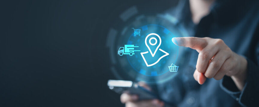 A person using a smartphone to track delivery location in real time, symbolizing logistics management, courier service, route optimization, and live shipping status in e-commerce operations.